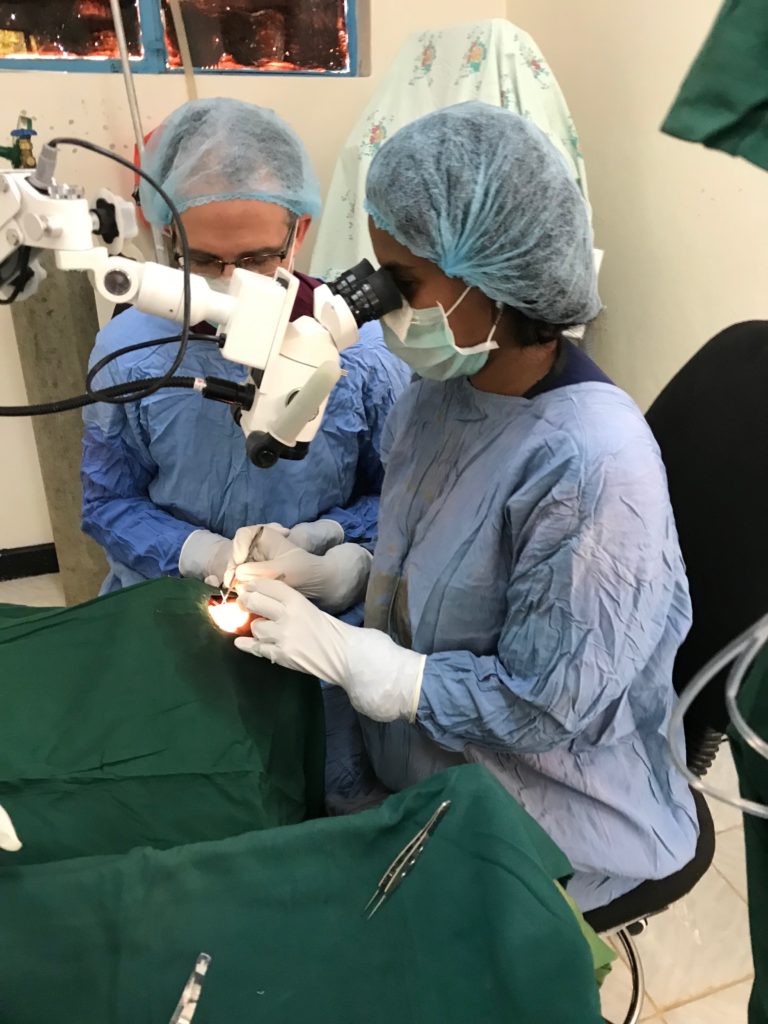 Dr. Dimmig teaches glaucoma surgery techniques to the local surgeon Dr. Hiwot.